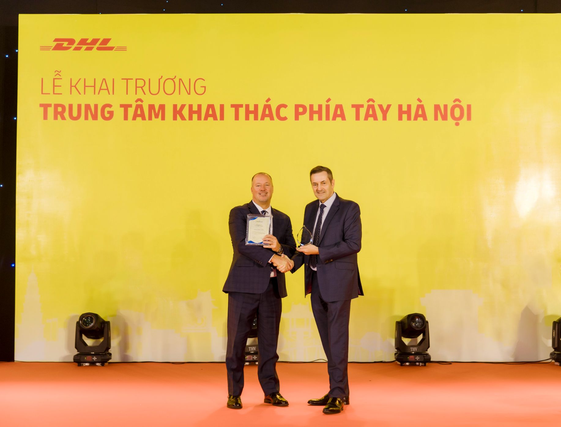 Travis Cobb Evp Global Network Operations Aviation Dhl Express On The Left Received 100th Tapa A Certificate In Apec From Tapa Apac Chairman 2