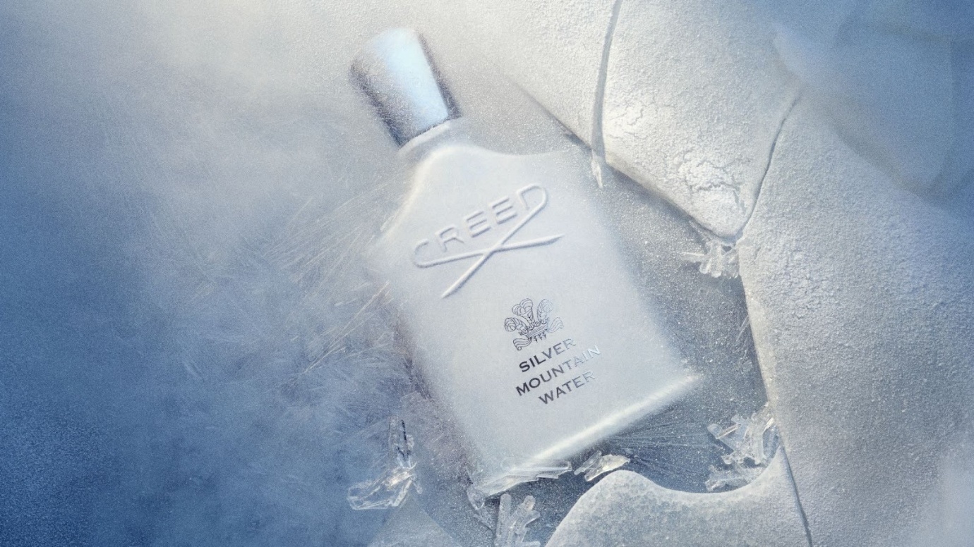 A white bottle of liquid on ice
AI-generated content may be incorrect.